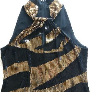 Black and Gold sequence top. Size Large.